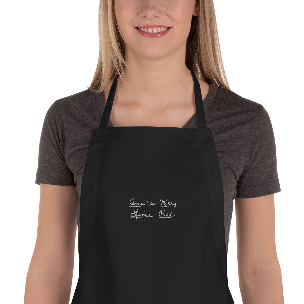 Embroidered apron printed with a handwritten recipe